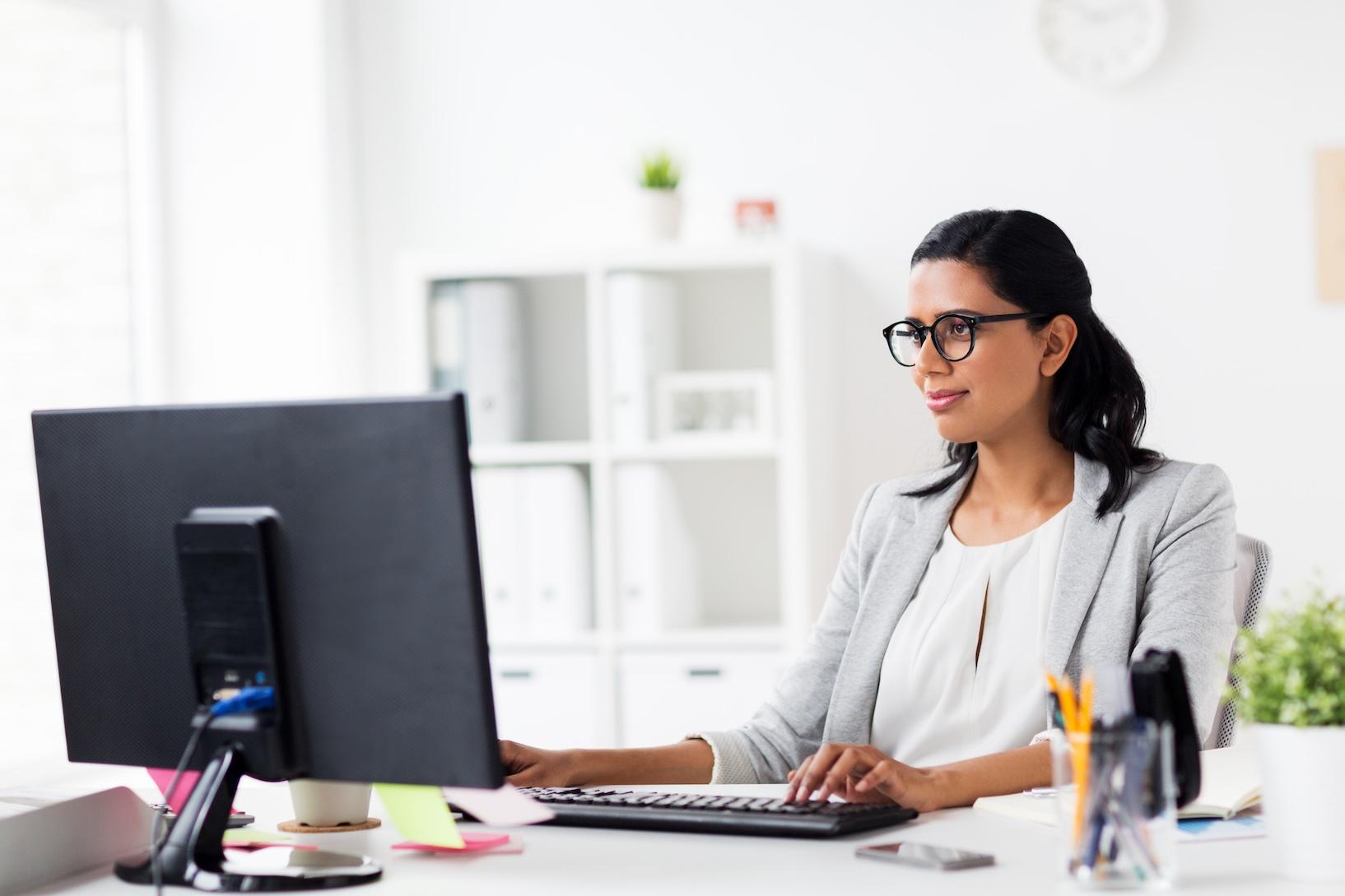 Indian professional reviewing work visa documents, illustrating visa sponsorship jobs for Indians in 2026